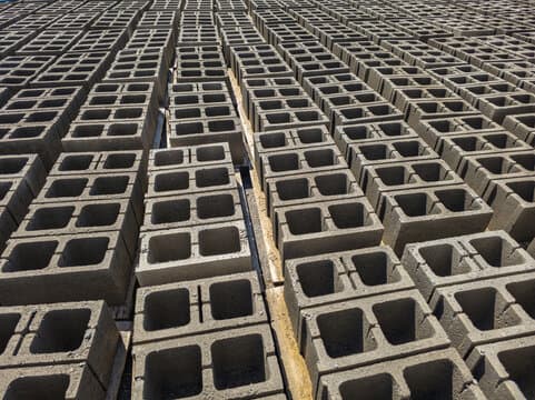 Rows of hollow blocks stocked and ready at the Greenstone yard